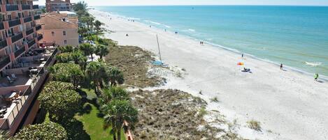 On the beach, sun-loungers, beach towels