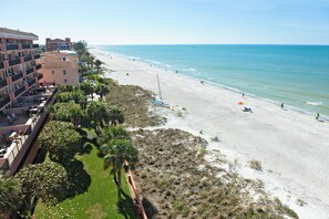 On the beach, sun-loungers, beach towels