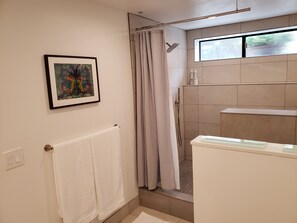 Shower, hair dryer, towels, soap