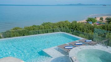 2 outdoor pools, open 7:00 AM to 10:00 PM, pool loungers