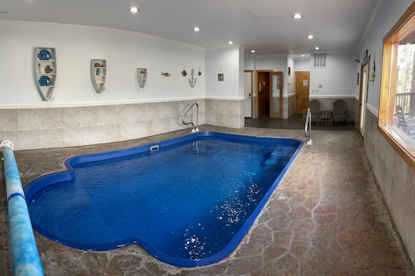 Lower level Pool depth 45” by railing and goes down to 56”Pool size 11ft x 19ft