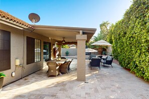 Outdoor dining - High-end home with private pool, enclosed yard, pizza oven & putting green (Scottsdale)