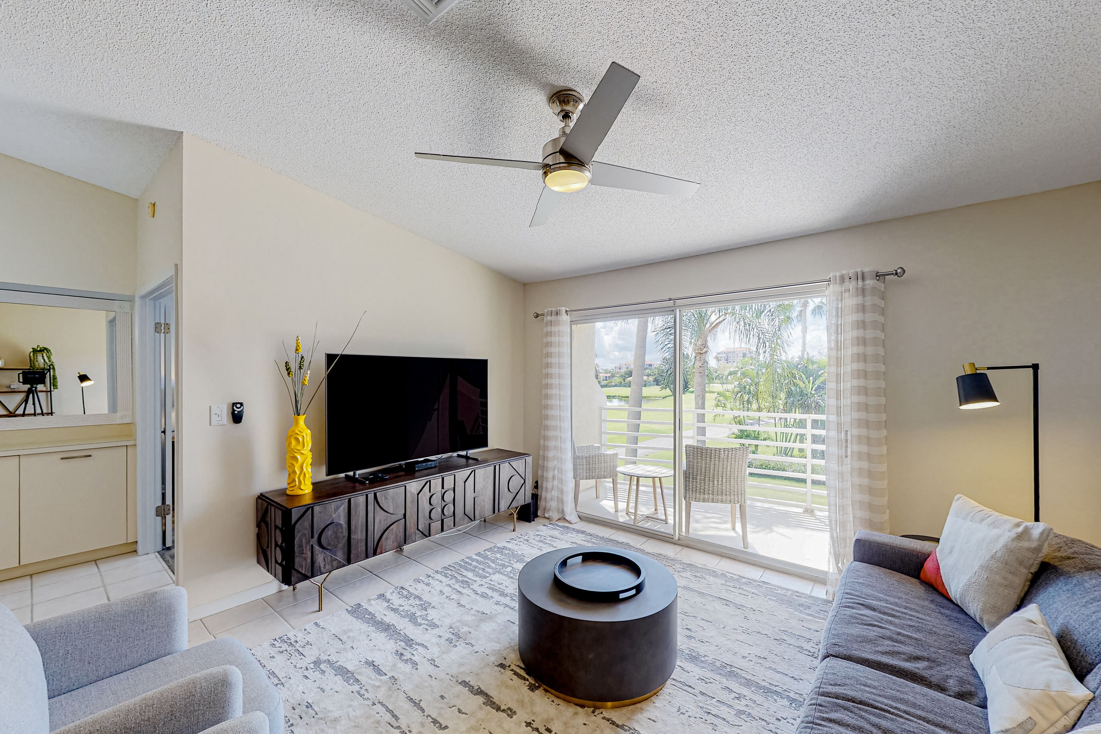 2nd-Floor Condo Overlooking Country Club Greens w/Free WiFi, AC, and Shared Pool