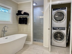 Combined shower/tub, hair dryer, towels, soap