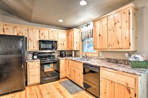 Fridge, microwave, stovetop, dishwasher - Fire Pit & Forest Views: Secluded Murphy Cabin! (Murphy)