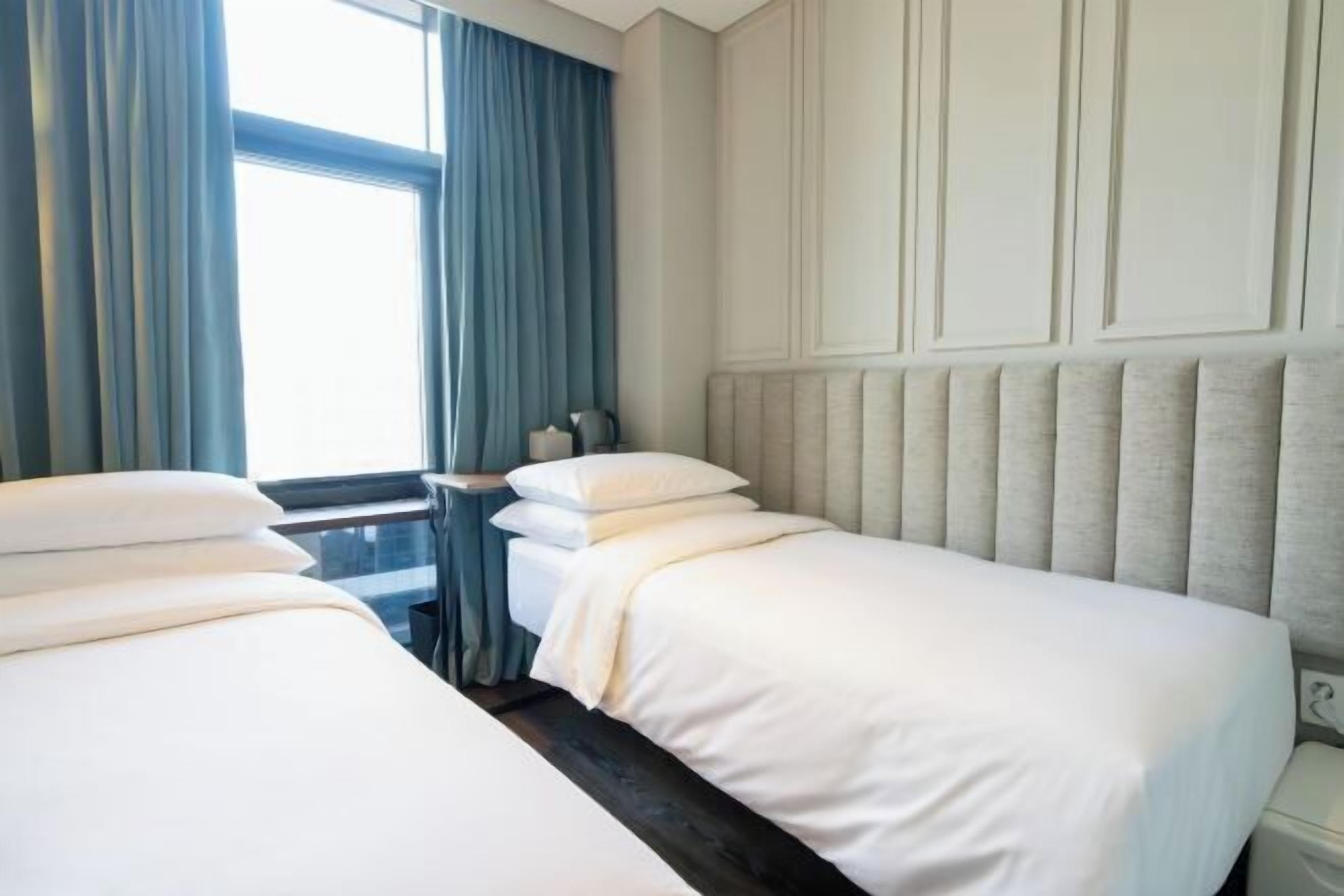 Premium bedding, down duvets, pillow-top beds, in-room safe