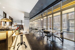 Breakfast, lunch, dinner served; Modern European cuisine, garden views 