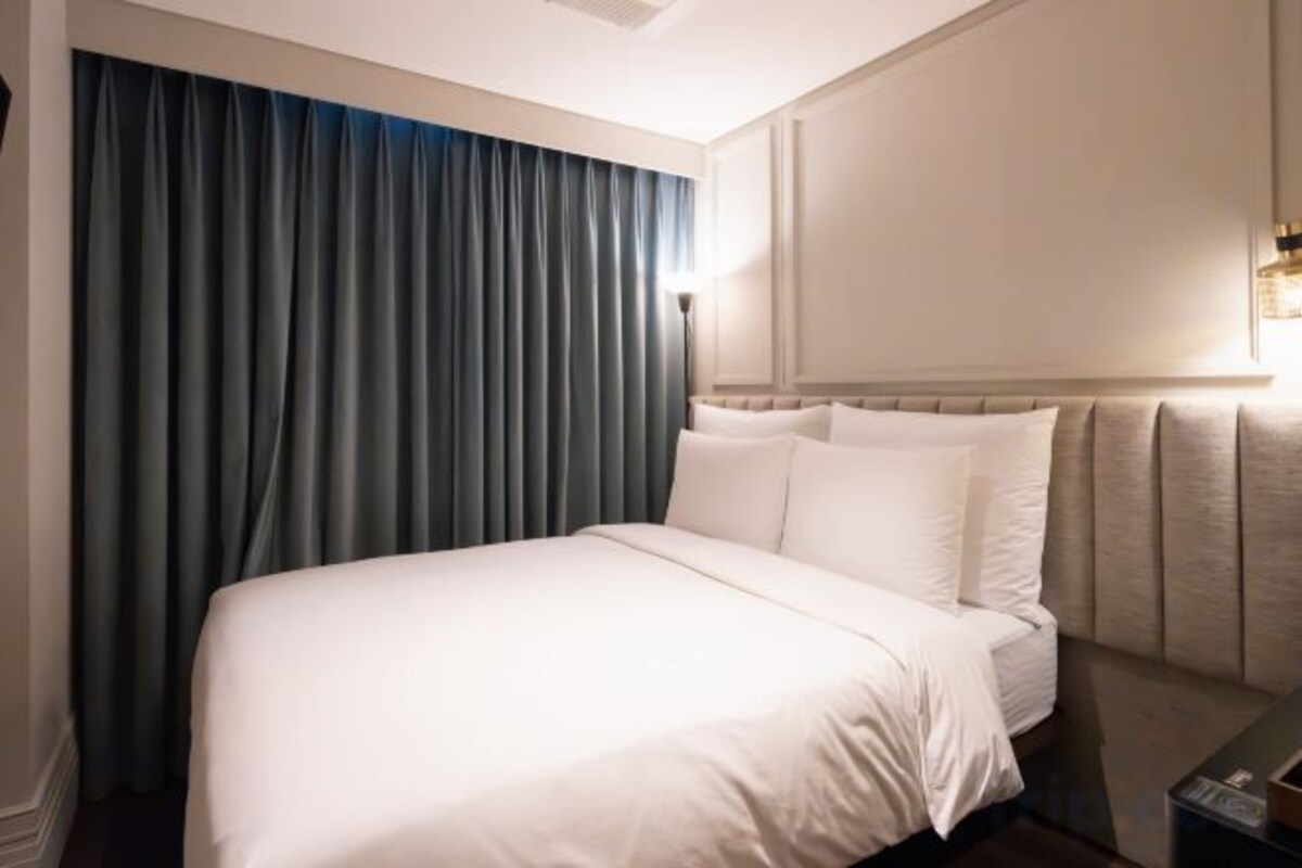 Premium bedding, down duvets, pillow-top beds, in-room safe