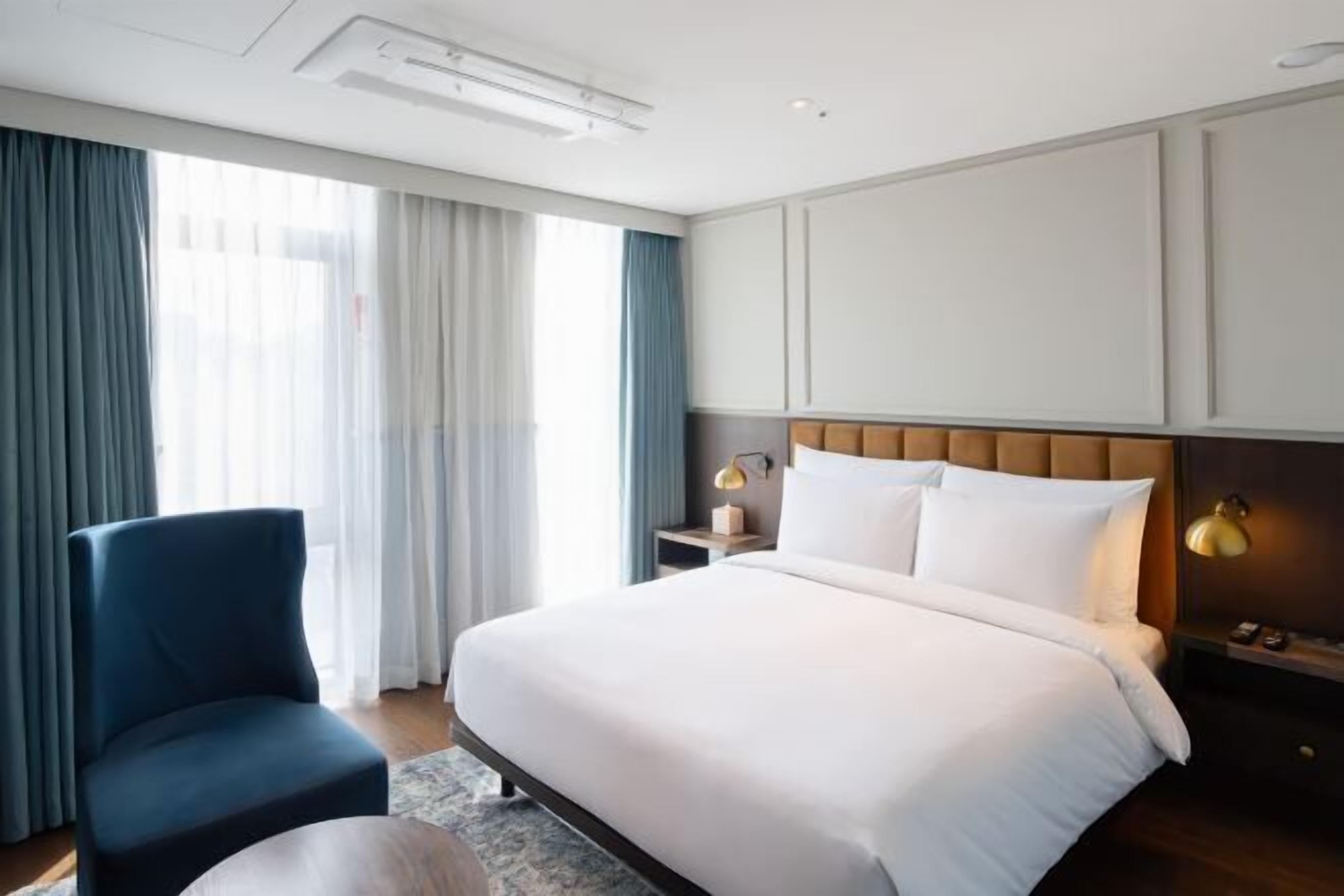 Premium bedding, down duvets, pillow-top beds, in-room safe