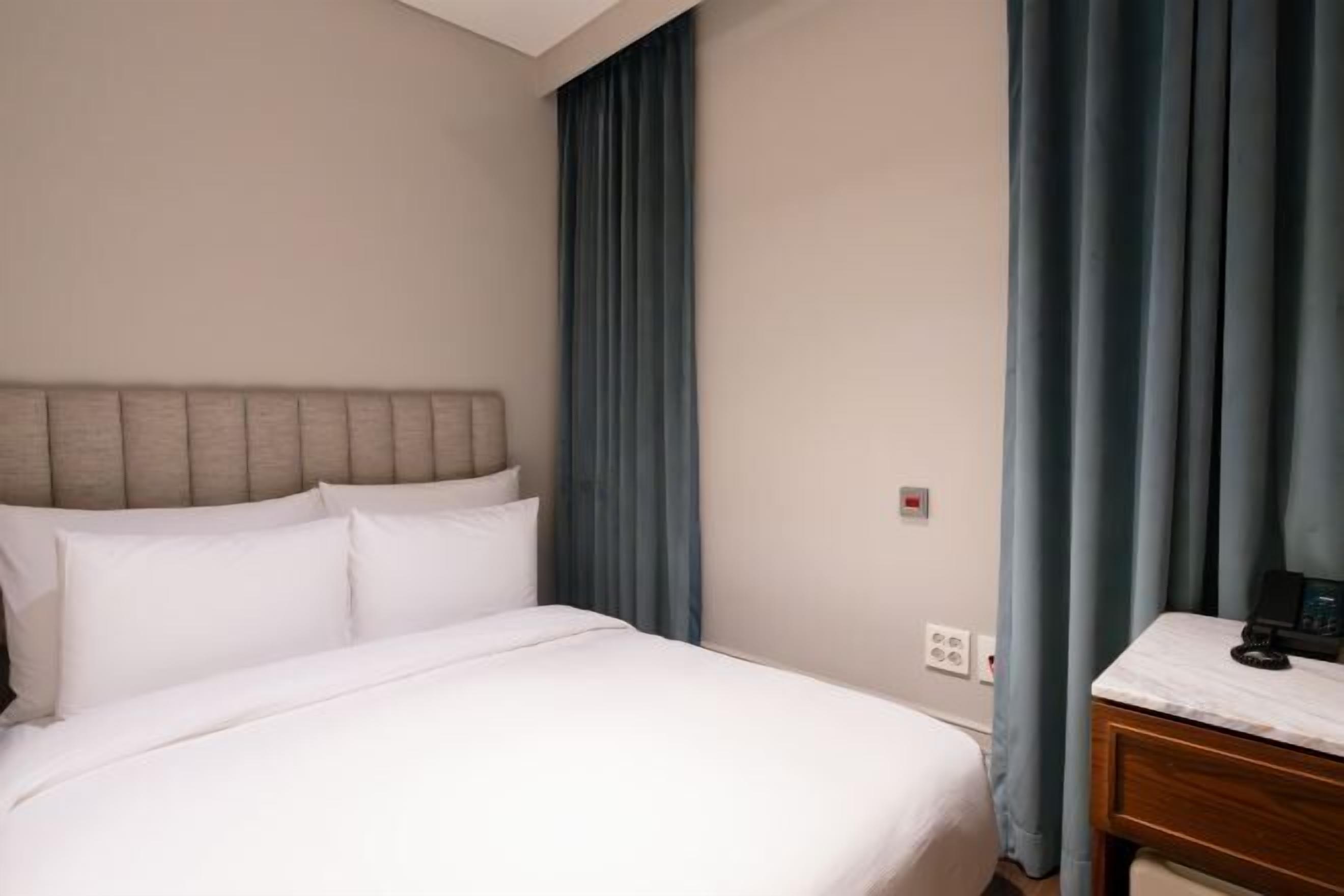 Premium bedding, down duvets, pillow-top beds, in-room safe