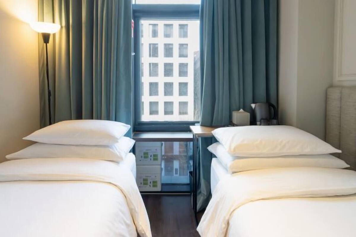 Premium bedding, down duvets, pillow-top beds, in-room safe