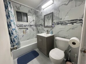 Hair dryer, towels, soap, shampoo