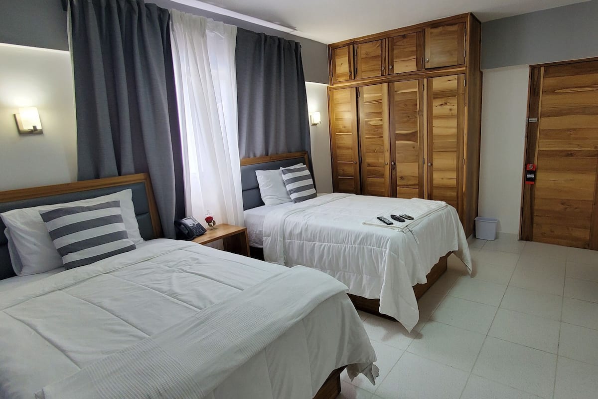 deluxe room, 1 bedroom | egyptian cotton sheets, premium bedding, down duvets, pillow-top beds