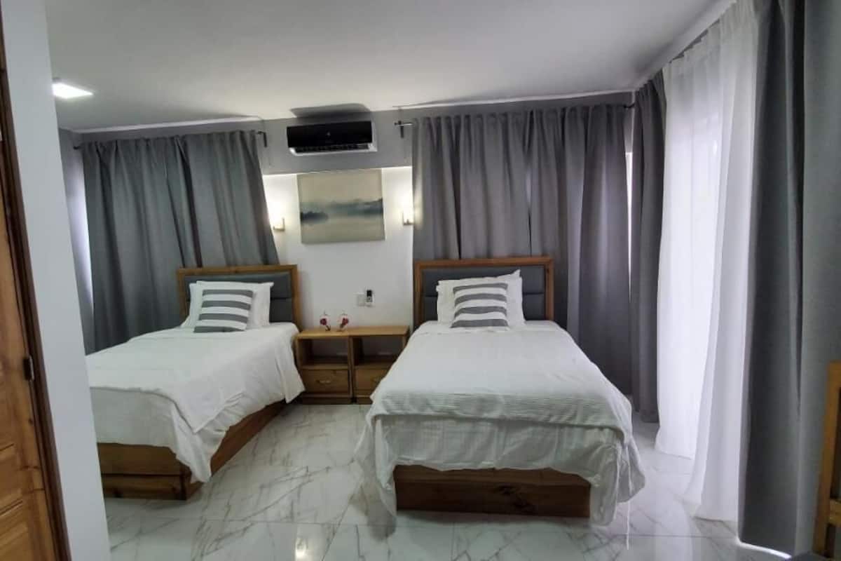 premium room | egyptian cotton sheets, premium bedding, down duvets, pillow-top beds