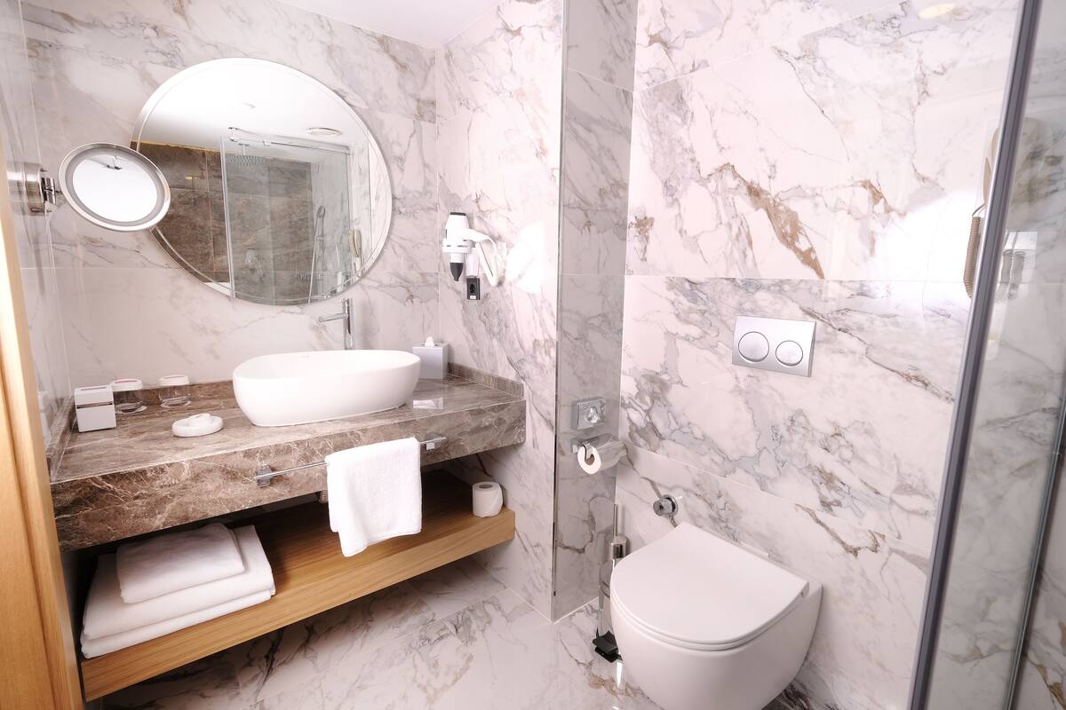 shower, rainfall showerhead, hair dryer, slippers