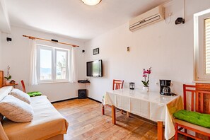 Apartment, Multiple Beds | Living room | 30-inch TV with digital channels, fireplace - A1-apartment 50m From the Beach With the sea View (Korcula)