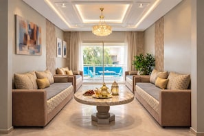 Apartment, 2 Bedrooms, Accessible, Balcony | Living room | Books - Luxurious Apartment in Sidi Bou Zid With Garden View (Nouaceur)
