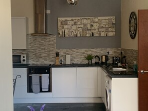 Apartment, 2 Bedrooms | Private kitchen | Fridge, microwave, electric kettle, toaster