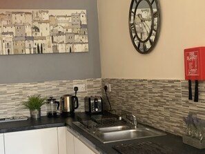 Apartment, 2 Bedrooms | Private kitchen | Fridge, microwave, electric kettle, toaster