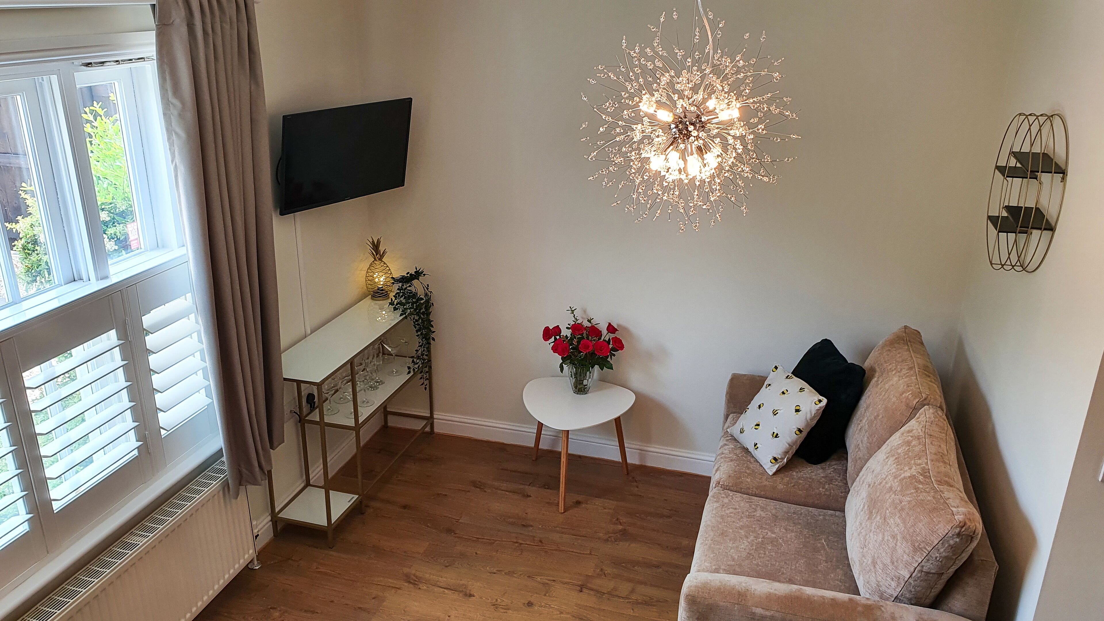 Deluxe House | Living area | 32-inch Smart TV with digital channels, TV