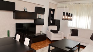 Family Apartment | Living area | Flat-screen TV - HomeRent White (Novi Sad)