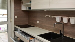 Family Apartment | Private kitchen | Full-size fridge, oven, dishwasher, cookware/dishes/utensils - HomeRent White (Novi Sad)