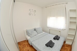 Apartemen Keluarga | 2 kamar tidur, setrika/meja setrika, tempat tidur bayi, dan Wi-Fi gratis