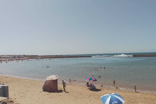 On the beach, sun loungers, beach towels