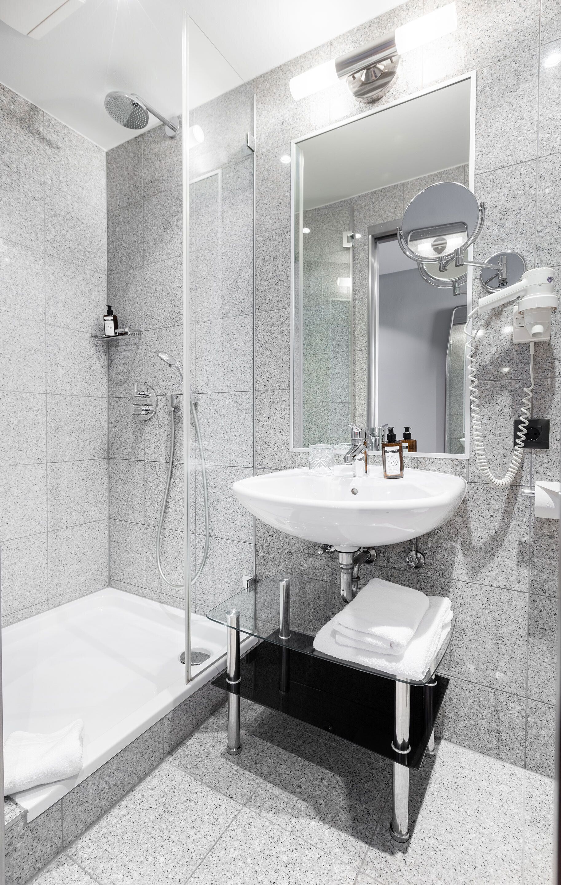 classic single room | bathroom | shower, rainfall showerhead, hair dryer, towels
