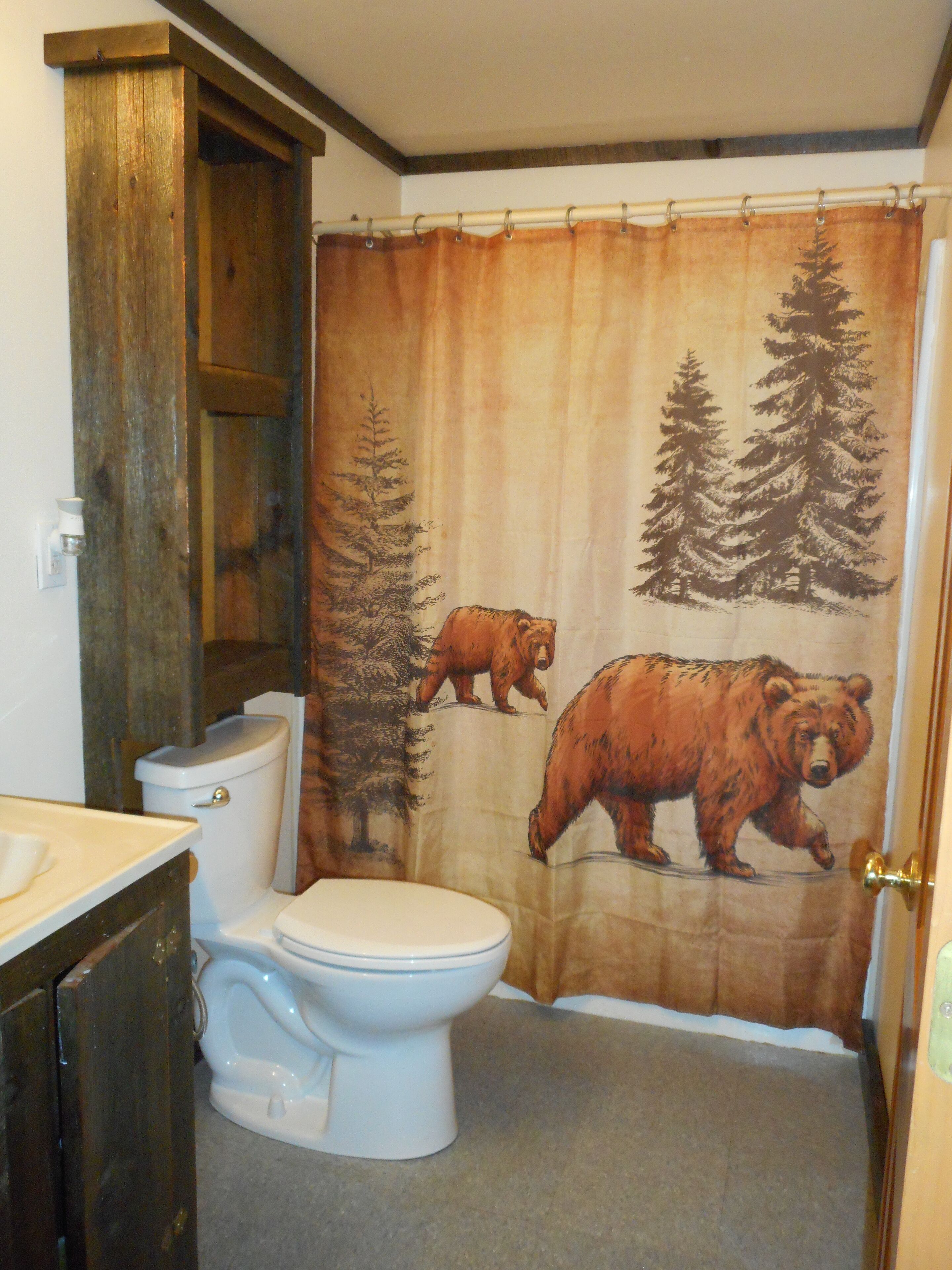 Combined shower/bathtub, towels, soap, shampoo