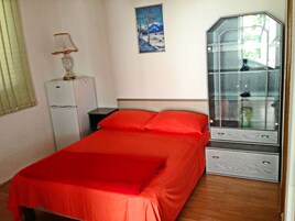 Apartment, 1 Queen Bed | 1 bedroom, iron/ironing board, free WiFi, bed sheets
