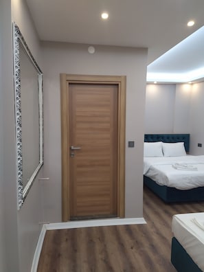Economy Quadruple Room | Premium bedding, minibar, in-room safe, individually decorated - Bonami Hotel (Istanbul)