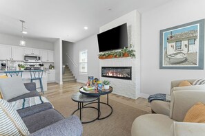 Smart TV, fireplace, books