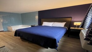 Rom – signature, 1 queensize-seng, massasjebadekar | Skrivebord og wi-fi (inkludert)