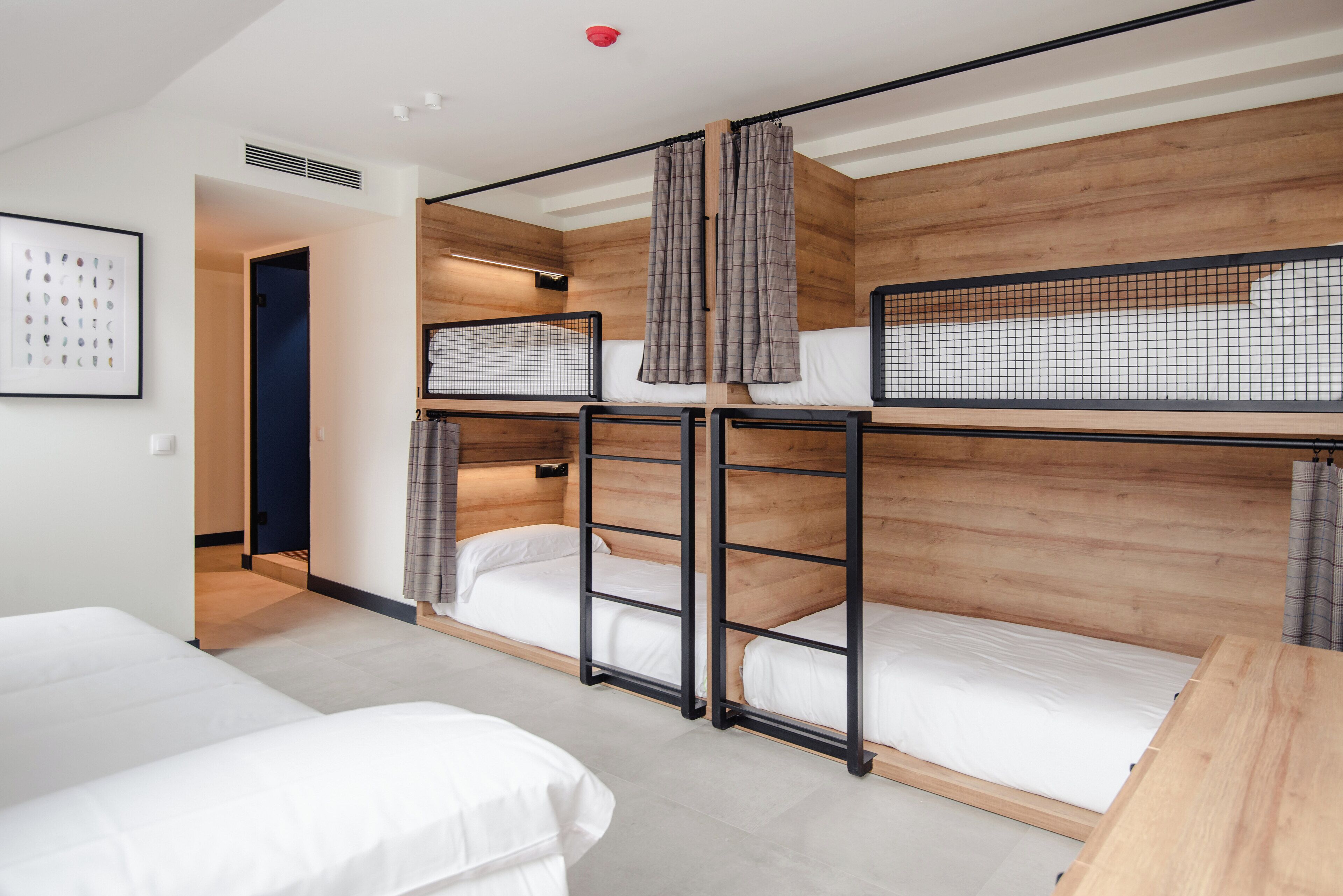 Premium bedding, down duvets, blackout curtains, soundproofing