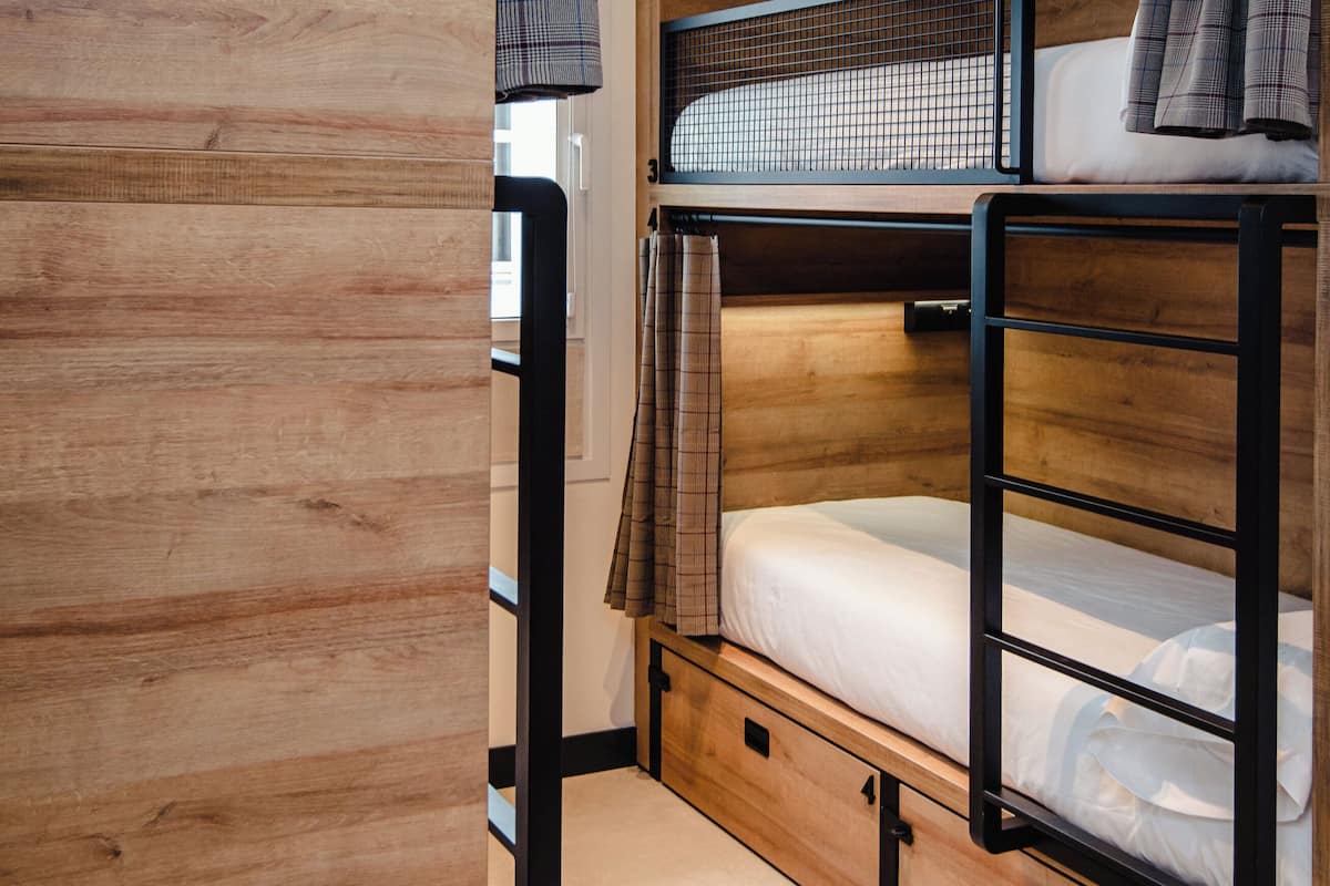 Premium bedding, down duvets, blackout curtains, soundproofing