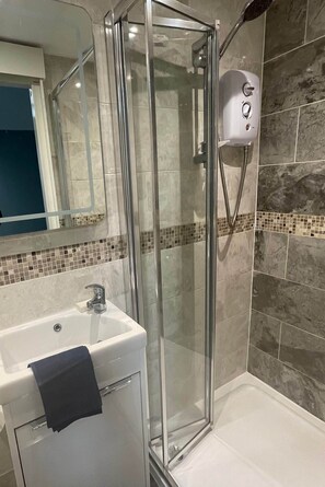 Douche, sèche-cheveux