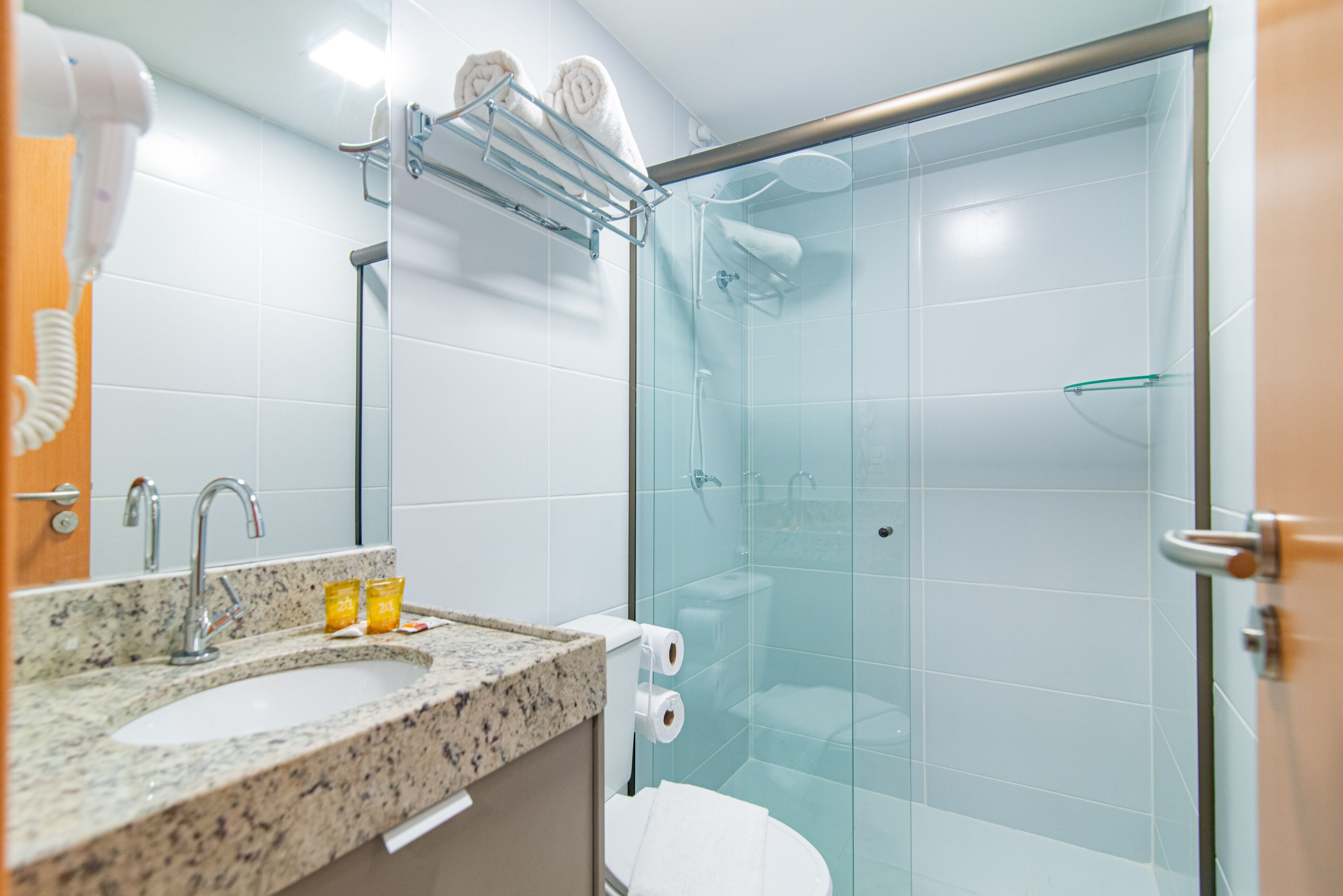 family quadruple room | bathroom | rainfall showerhead, hair dryer, towels, soap