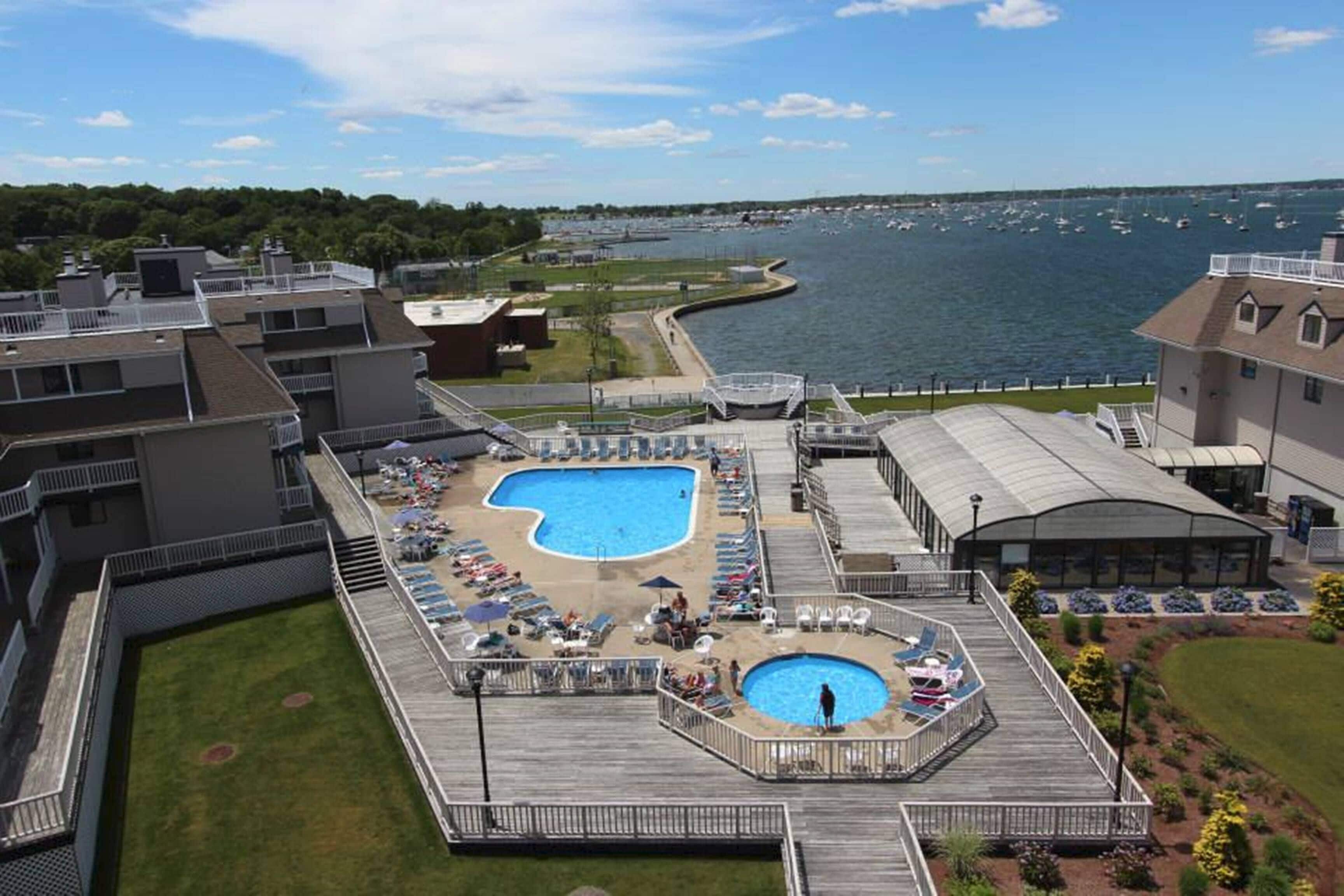 Indoor pool, seasonal outdoor pool, pool umbrellas, pool loungers