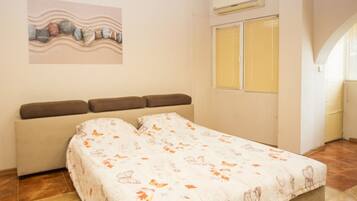 City Apartment (Top Center) | Living area | Flat-screen TV