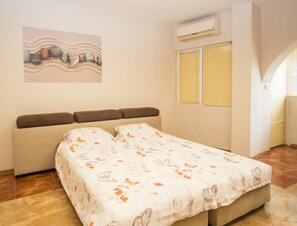 City Apartment (Top Center) | Living area | Flat-screen TV