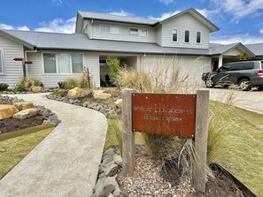 Property grounds - Coastal Retreat - POOL,  SPA & FIRE. Nature boardwalk, creek & inlet. 5 bedroom. (Inverloch)