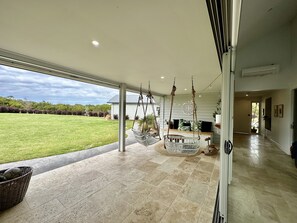Terrace/patio - Coastal Retreat - POOL,  SPA & FIRE. Nature boardwalk, creek & inlet. 5 bedroom. (Inverloch)