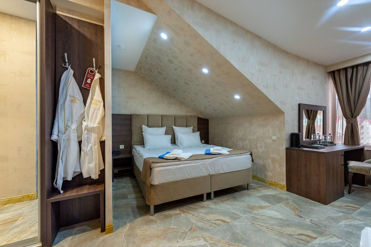 Family Quadruple Room | 1 bedroom, in-room safe, desk, free WiFi