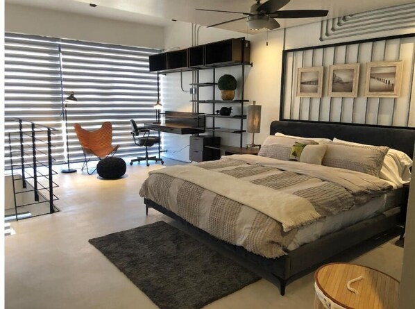 1 bedroom, desk, iron/ironing board, travel crib