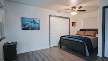 1 bedroom, desk, iron/ironing board, travel crib