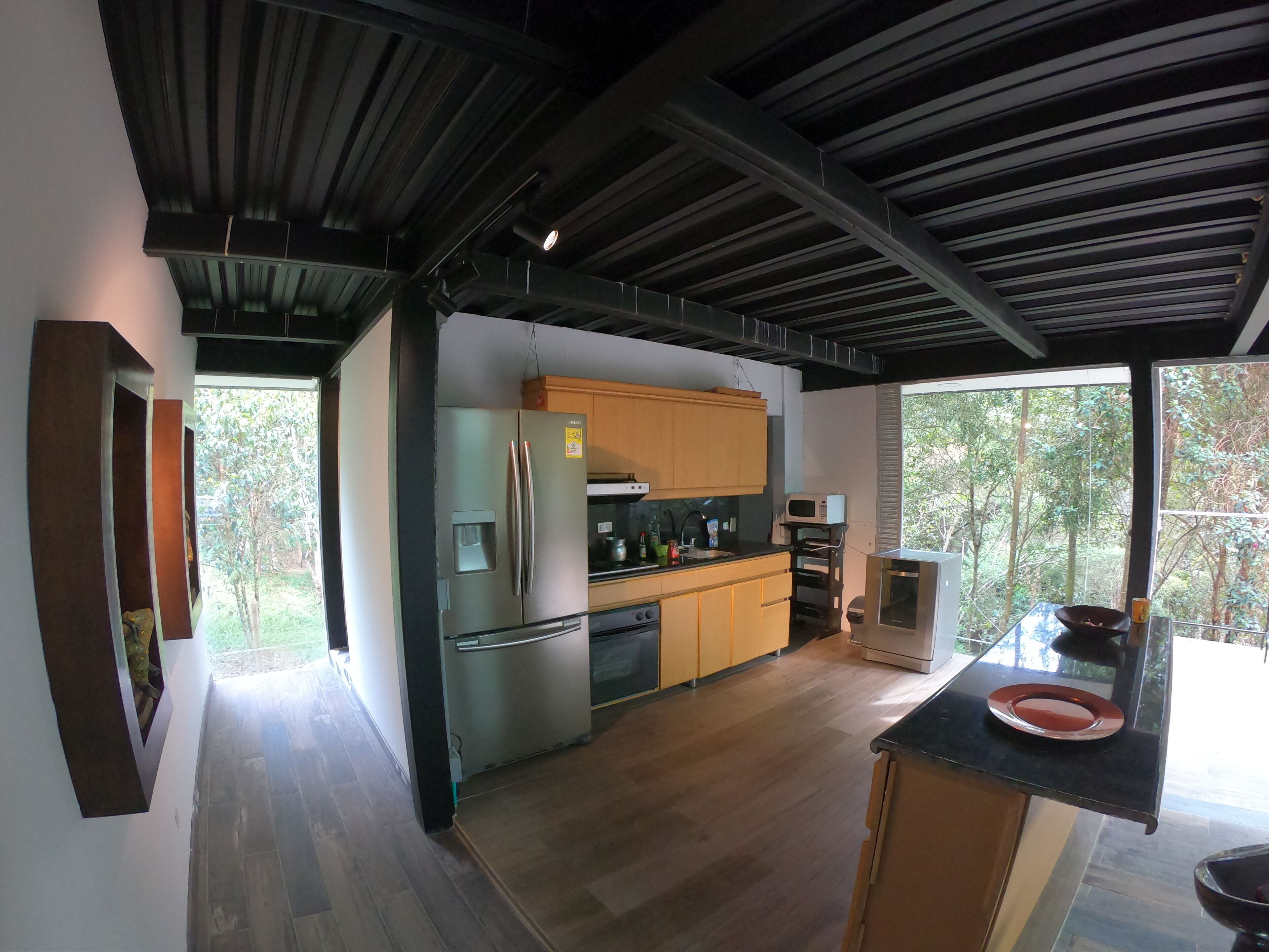 Microwave, toaster, cookware/dishes/utensils, kitchen islands