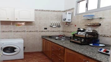 Fridge, stovetop, cookware/dishes/utensils