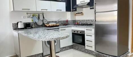 Fridge, oven, stovetop, coffee/tea maker