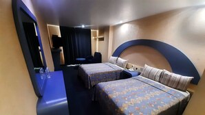 A hotel room with two beds, a desk, a chair, and a small table. - Hotel Pal (Mexico City)